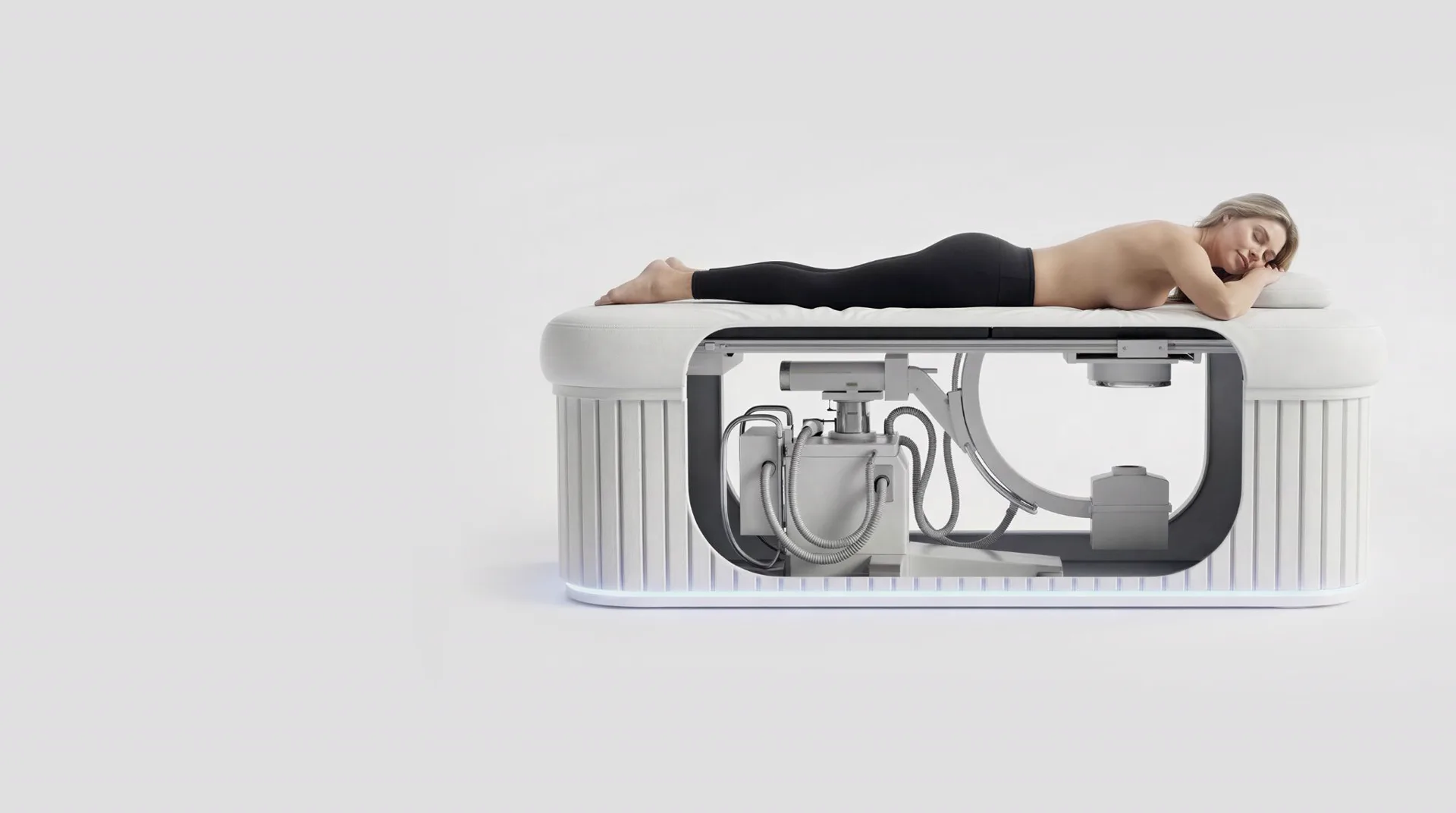 Clinician with a patient at the FemTech prone mammography bed concept