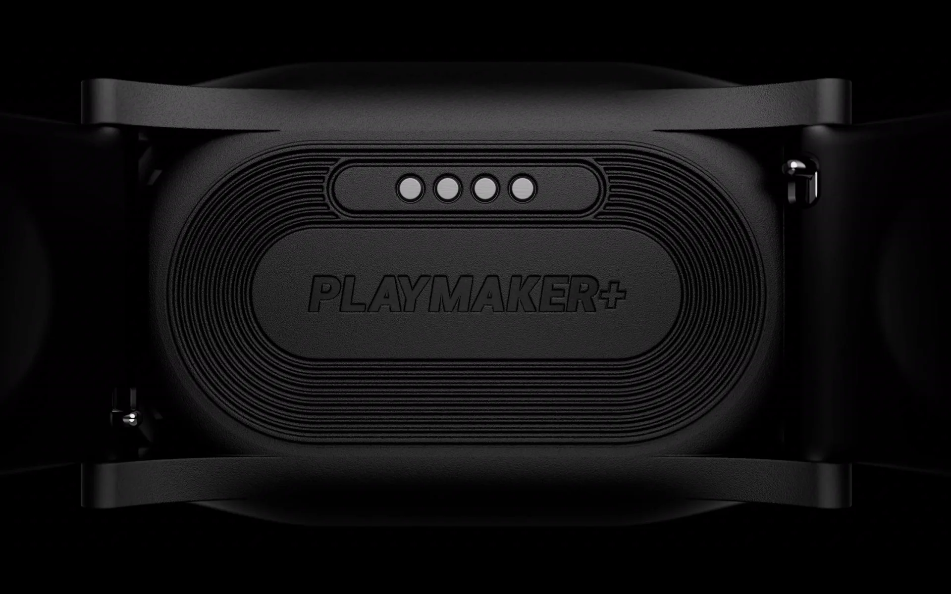 Close-up of the PlayMaker+ strap with the embossed logo and charging pins