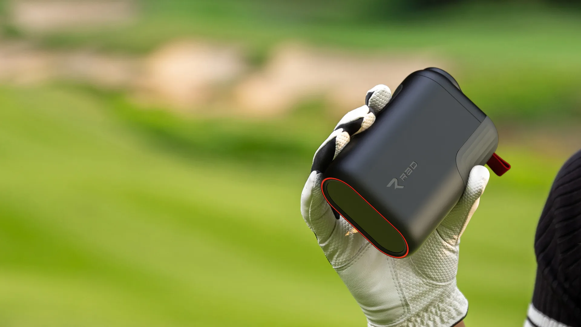 Golfer holding the Rad Lazer Pro on the course