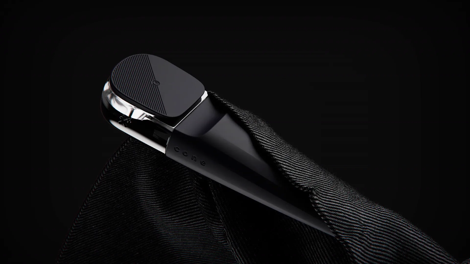 Ximbo pipe by Cone resting on a dark cloth
