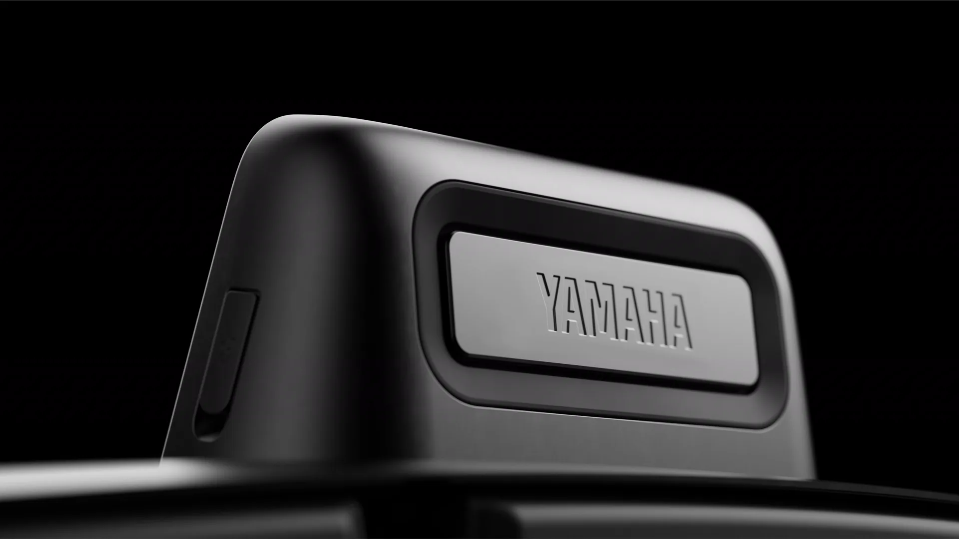 Close-up of the Yamaha badge on the speaker