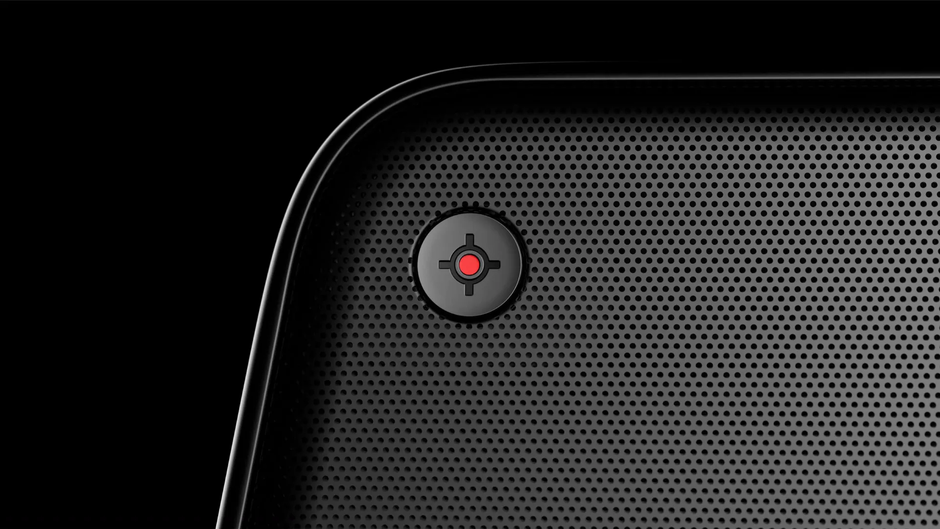 Close-up of the Yamaha in-dash speaker grille and control button